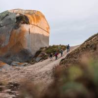 Walkers near Castle Rock, Flinders Island