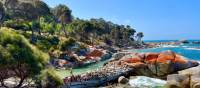 Hikers enjoying a dip at a secluded beach after a 9km coastal hike | Michael Buggy