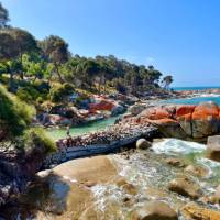 Hikers enjoying a dip at a secluded beach after a 9km coastal hike | Michael Buggy