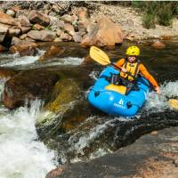 Having fun navigating the thrilling rapids of the Mersey River