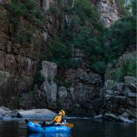 Be sure to take in the surrounding gorge walls as you paddle down the Mersey River