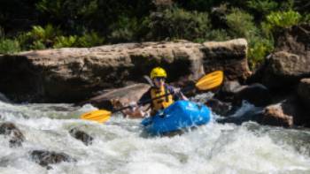 Heading down one of the many exciting rapids on the Mersey River