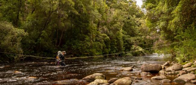 River crossing on the South Coast Track | John Dalton